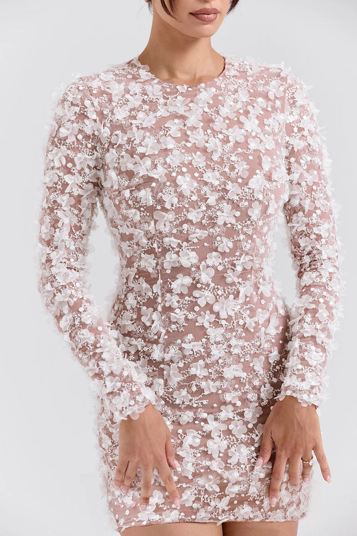 Elegant midi dress with a dramatic open back, tailored for sophisticated occasions. 5