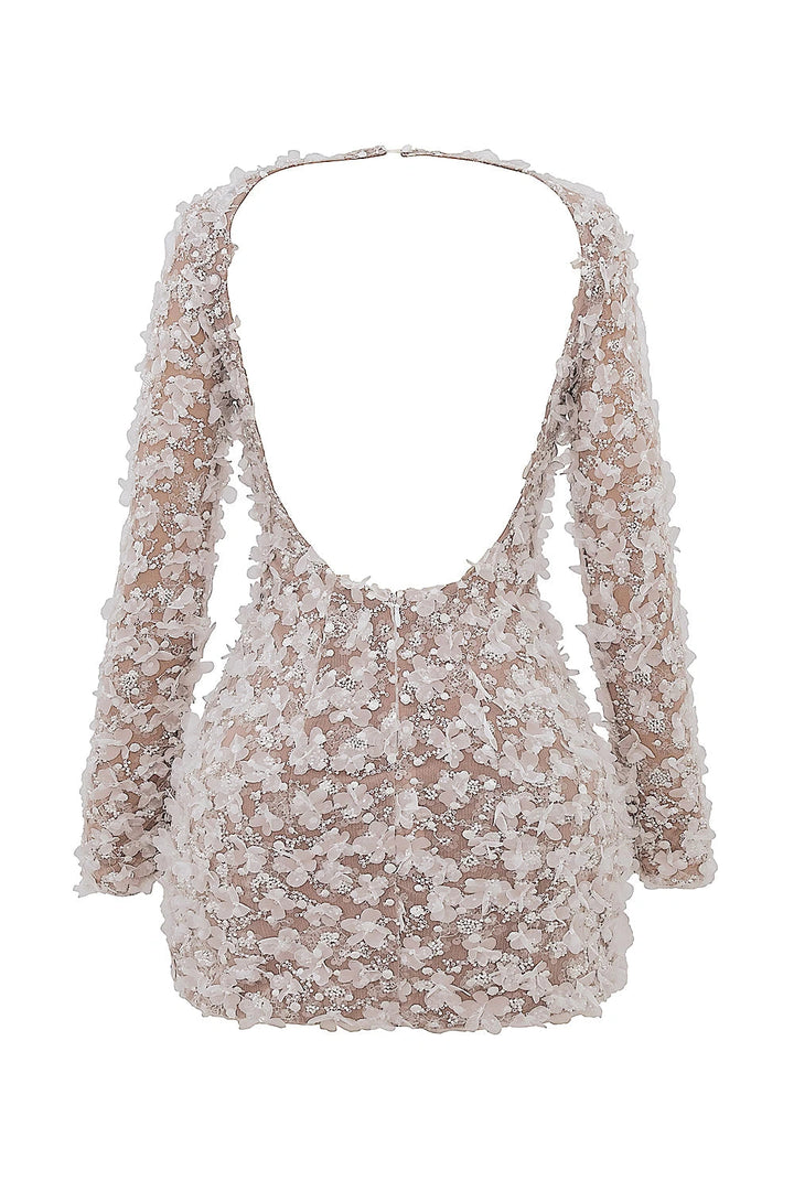 Elegant midi dress with a dramatic open back, tailored for sophisticated occasions. 7