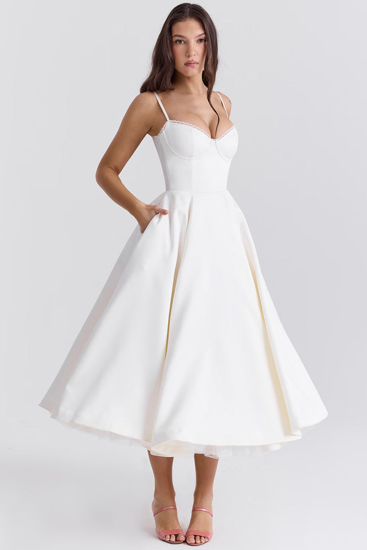 Elegant midi dress featuring a flowing tulle skirt, perfect for formal occasions. 11