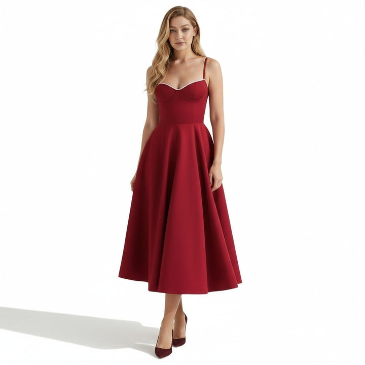 Elegant midi dress featuring a flowing tulle skirt, perfect for formal occasions. 12