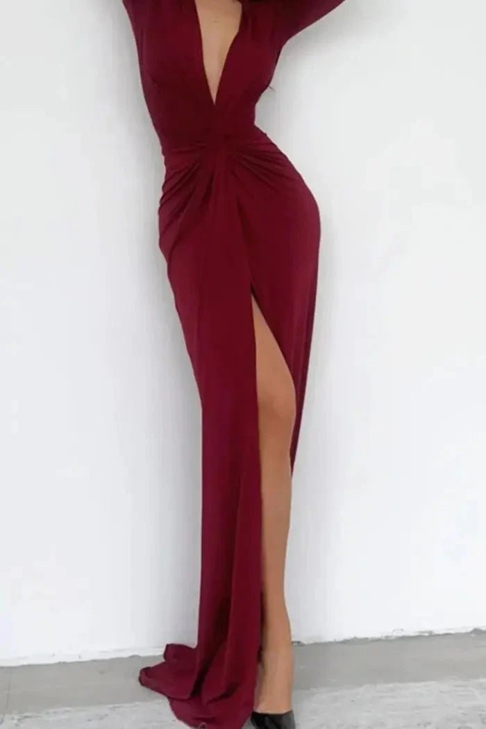 Elegant midi dress featuring a flattering V-neckline and pleated design, suitable for formal occasions. 9