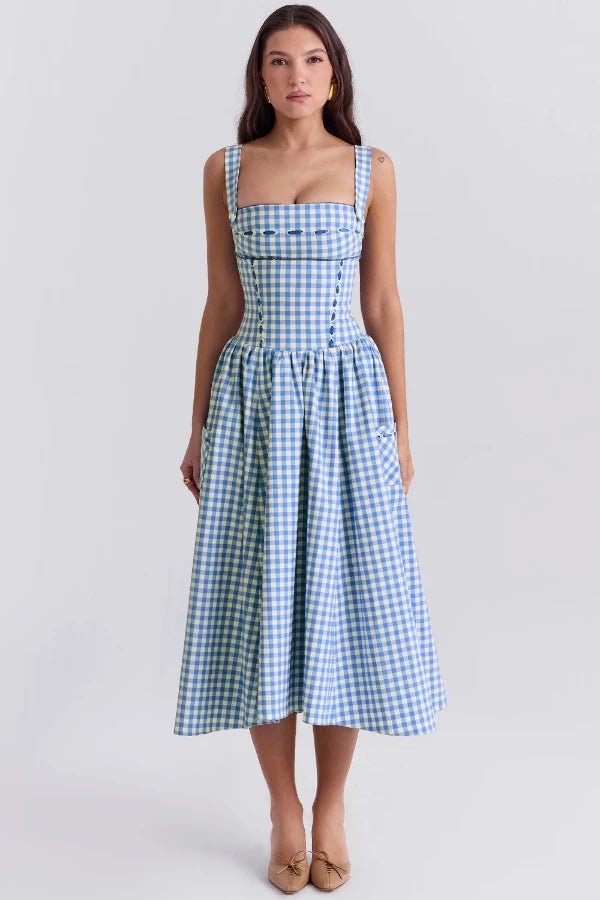 Elegant midi dress featuring an off-shoulder Bardot design with a draped silhouette, suitable for formal occasions. 1
