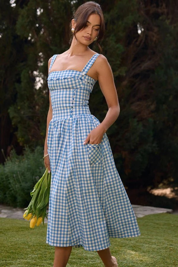 Elegant midi dress featuring an off-shoulder Bardot design with a draped silhouette, suitable for formal occasions. 2