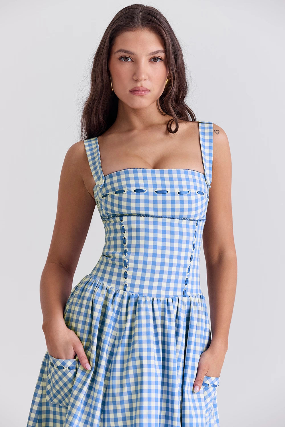 Elegant midi dress featuring an off-shoulder Bardot design with a draped silhouette, suitable for formal occasions. 5