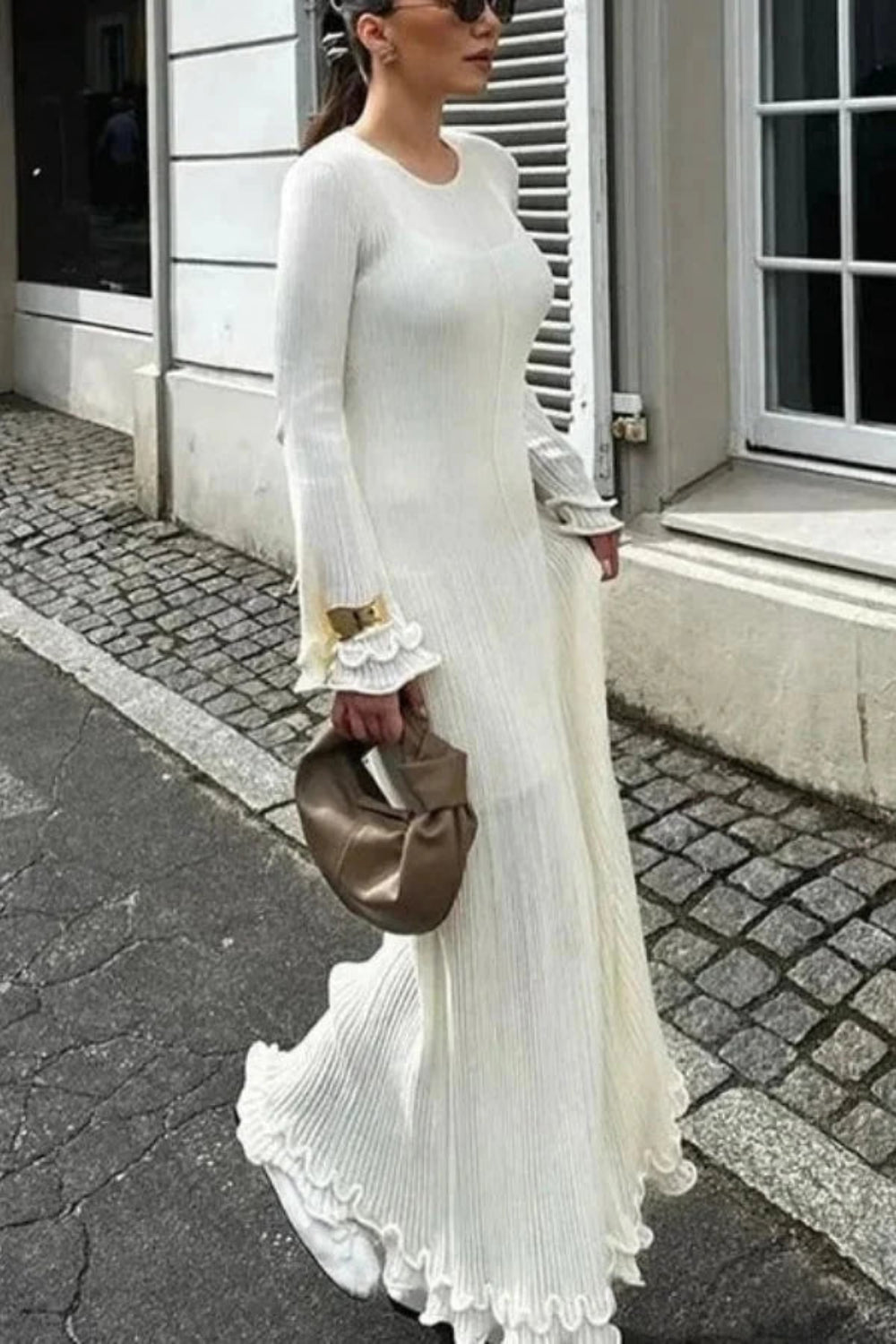 Midi dress with ruffled cuffs and a body-skimming silhouette, perfect for formal occasions. 1
