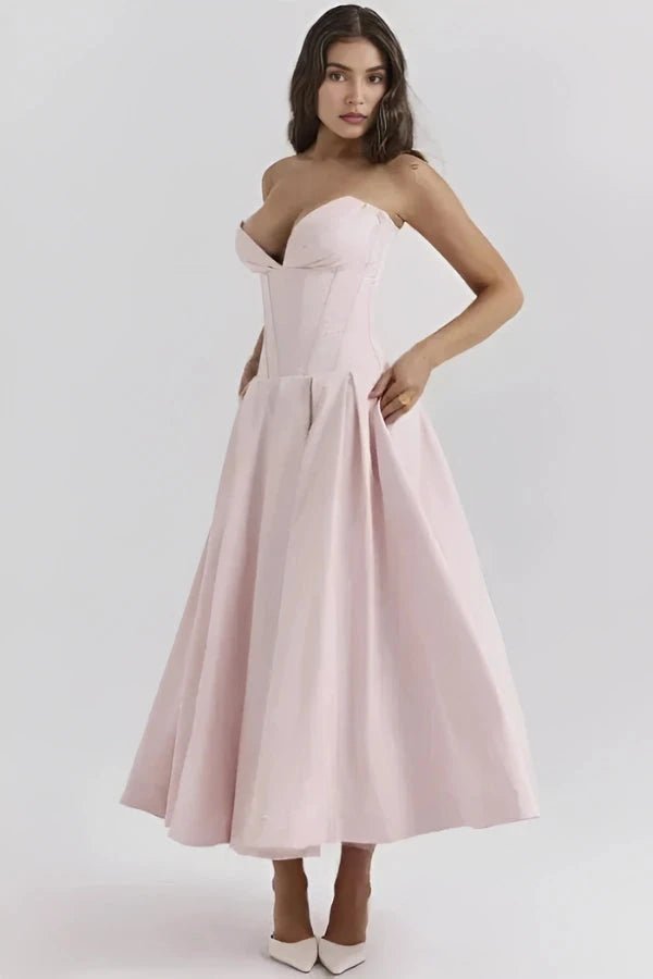 Elegant midi dress featuring a sculpted bodice and a voluminous skirt, perfect for formal occasions. 11