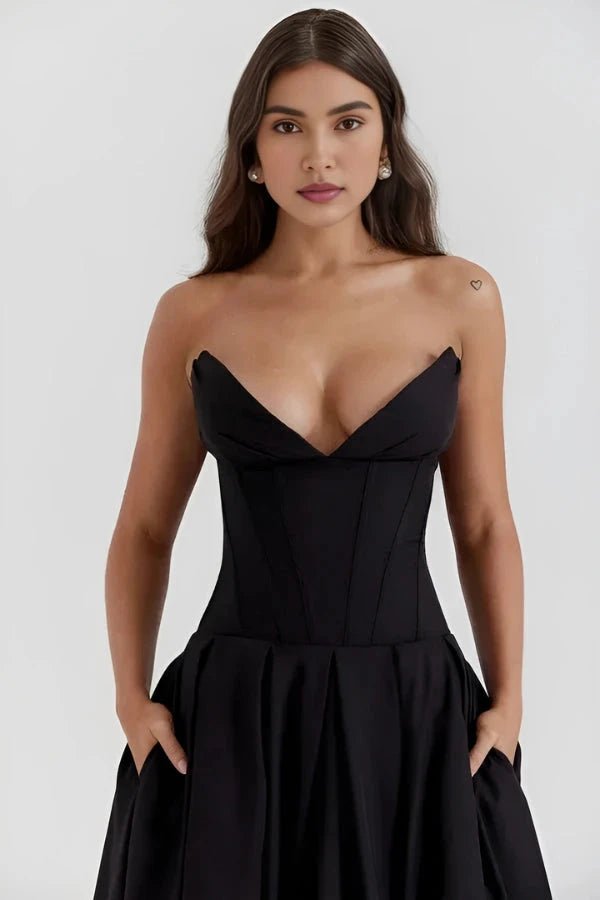 Elegant midi dress featuring a sculpted bodice and a voluminous skirt, perfect for formal occasions. 3