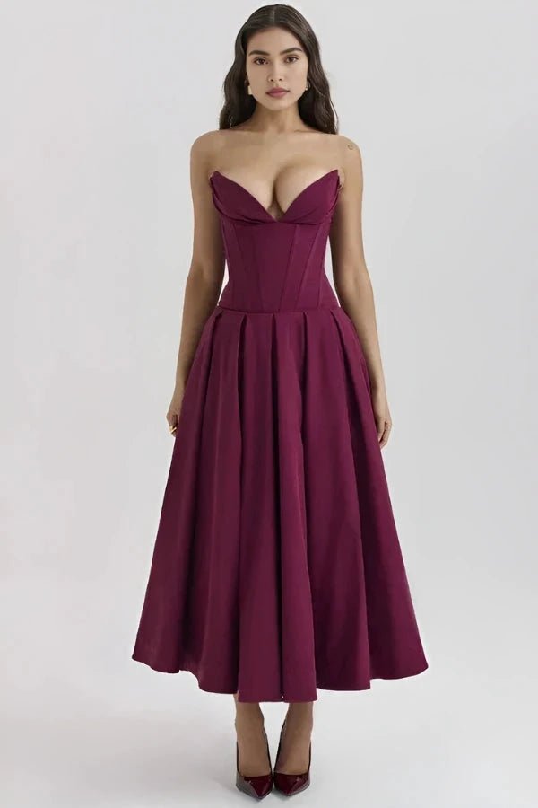 Elegant midi dress featuring a sculpted bodice and a voluminous skirt, perfect for formal occasions. 7
