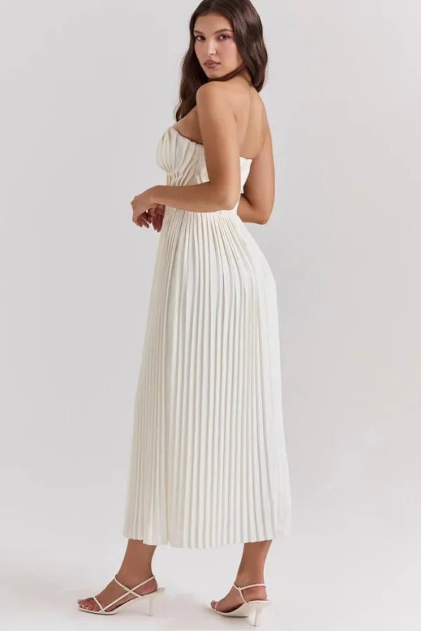 Elegant midi dress featuring a sweetheart neckline and a pleated skirt, perfect for formal occasions. 1