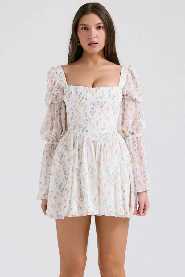 Elegant midi dress featuring a tiered design and floral print, perfect for formal events. 4