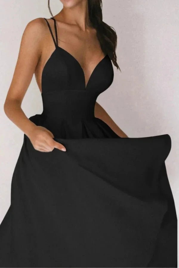 Elegant v-neck dress with a flattering silhouette, featuring an adjustable strappy design, perfect for formal occasions. 0