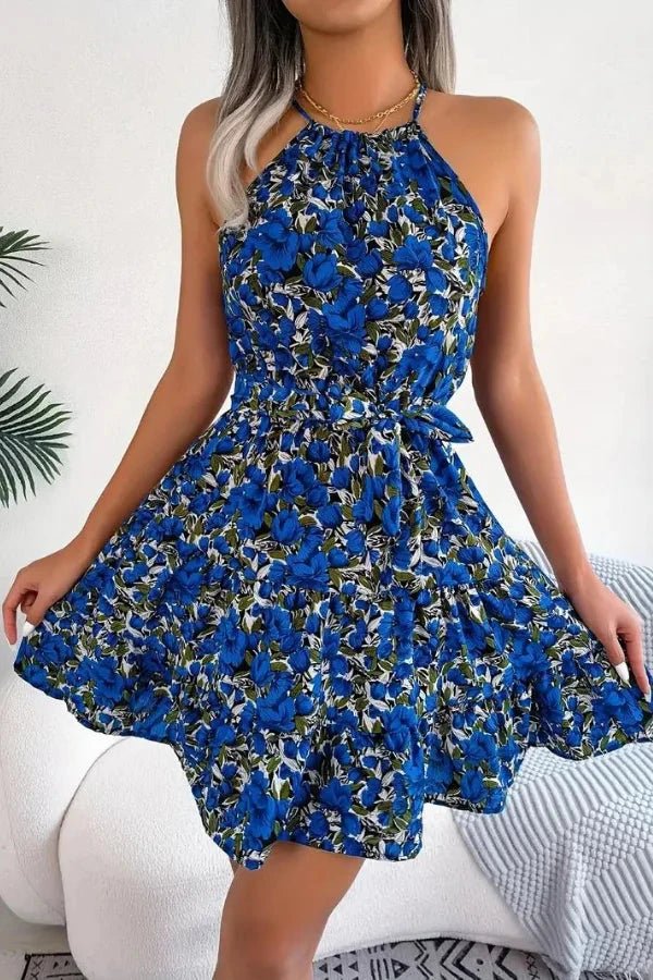 Halter dress featuring a ruffle design and floral print, ideal for summer gatherings. 0
