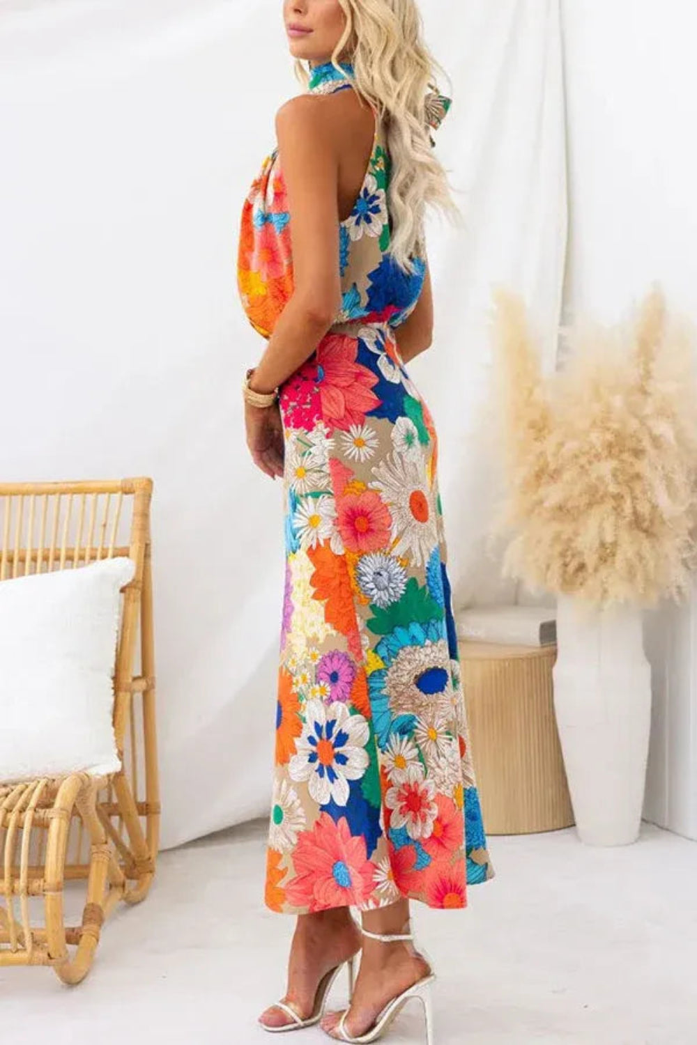 Halter maxi dress with an elegant A-line silhouette. 1