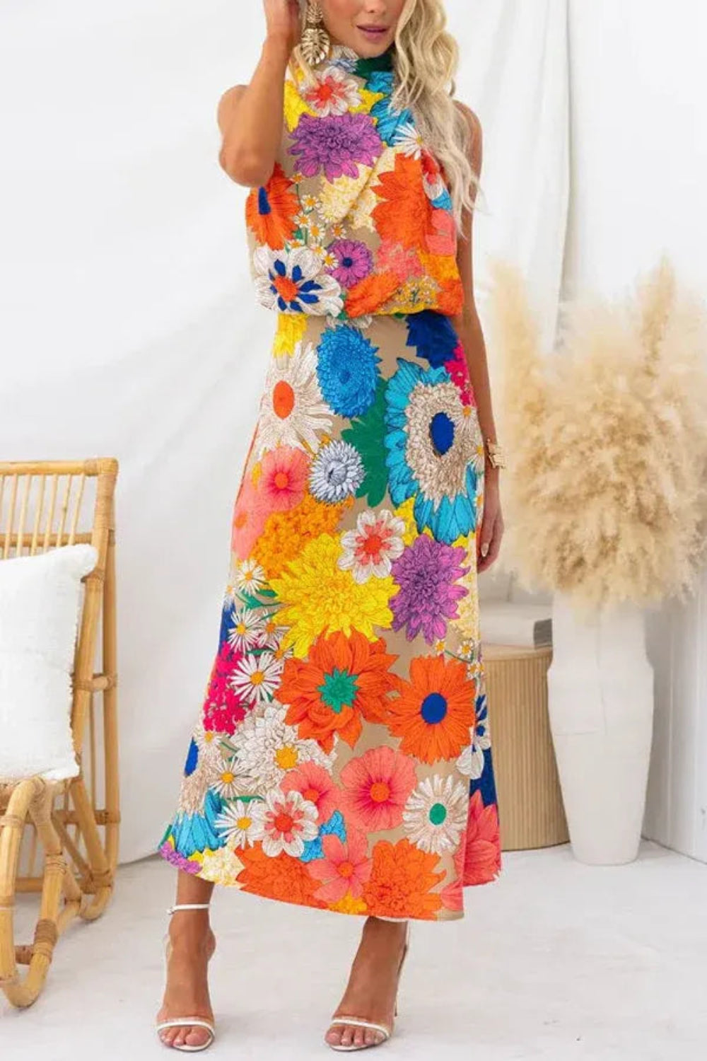 Halter maxi dress with an elegant A-line silhouette. 2