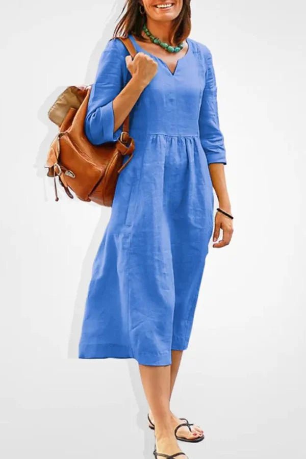 Long sleeve dress with a flowy silhouette, perfect for elegant occasions. 0