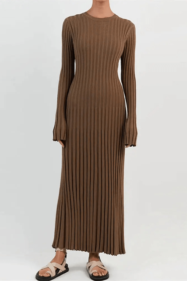 Long sleeve dress with ruffle details and an elegant hem, perfect for formal occasions. 8