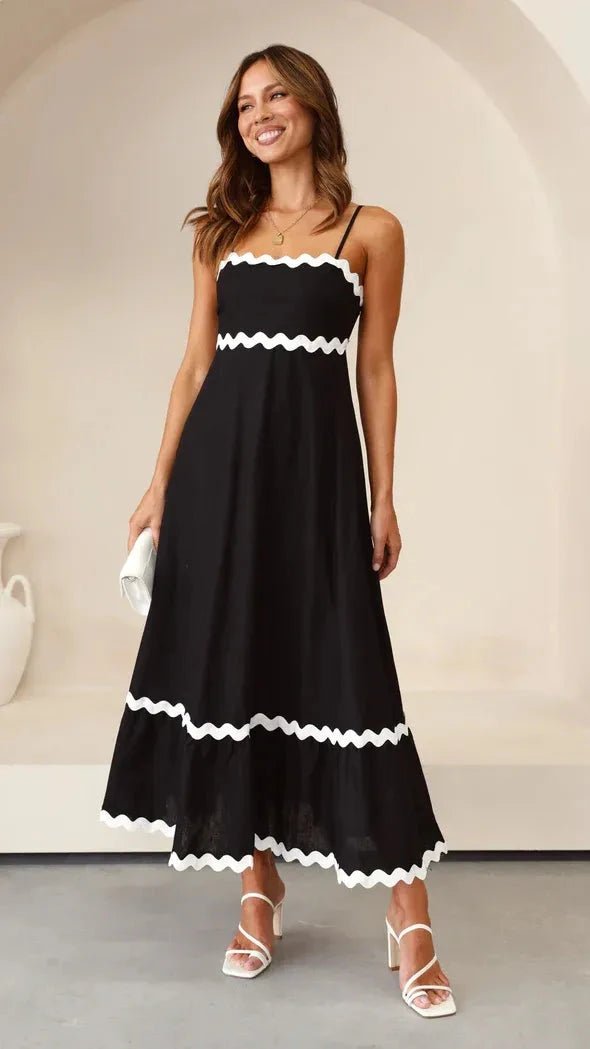 Maxi dress featuring adjustable straps and ric rac trim, designed in a flowy silhouette perfect for casual outings. 0