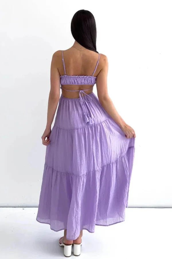 Maxi dress with a tie-up back design, featuring a flowing silhouette suitable for formal occasions. 3