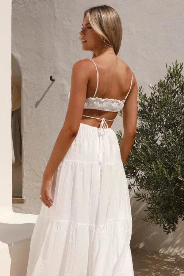 Maxi dress with a tie-up back design, featuring a flowing silhouette suitable for formal occasions. 4