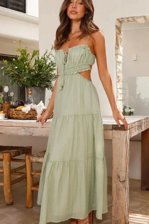 Maxi dress with a tie-up back design, featuring a flowing silhouette suitable for formal occasions. 9