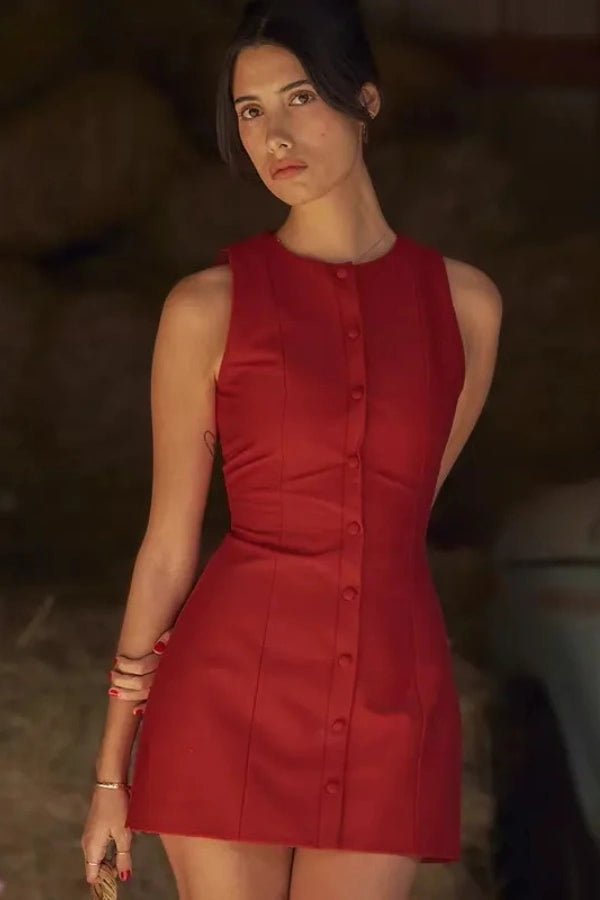 A mini dress featuring a button front design, with a fitted silhouette, suitable for casual outings. 0