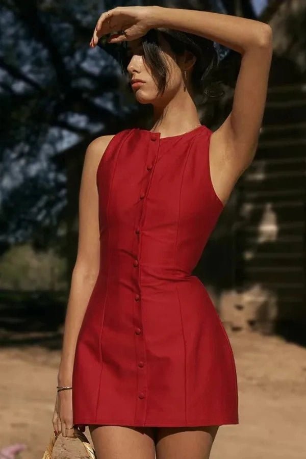 A mini dress featuring a button front design, with a fitted silhouette, suitable for casual outings. 2