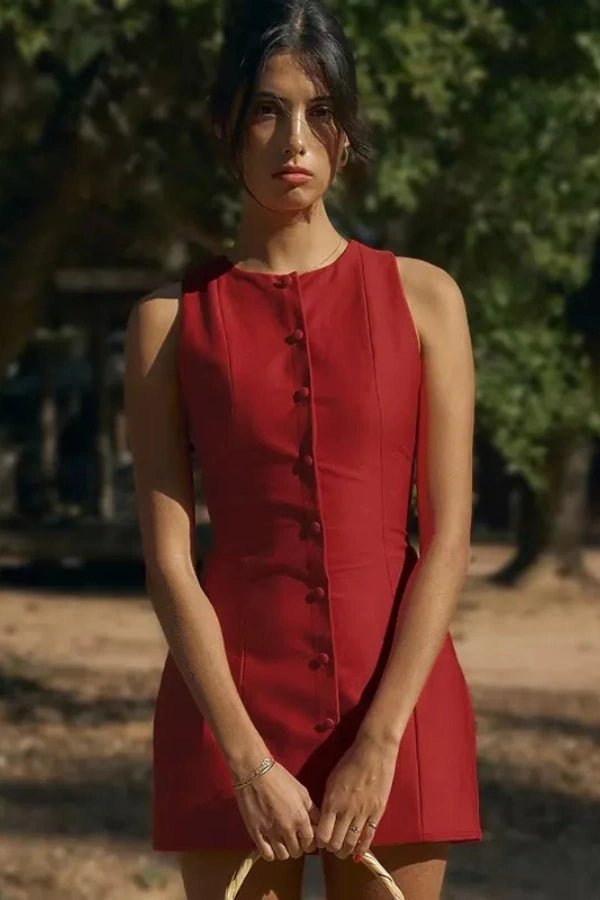 A mini dress featuring a button front design, with a fitted silhouette, suitable for casual outings. 3
