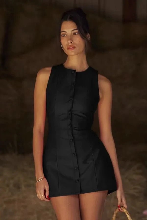 A mini dress featuring a button front design, with a fitted silhouette, suitable for casual outings. 5