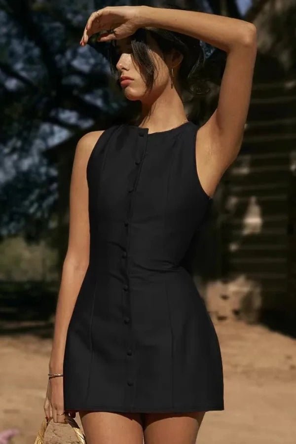 A mini dress featuring a button front design, with a fitted silhouette, suitable for casual outings. 7