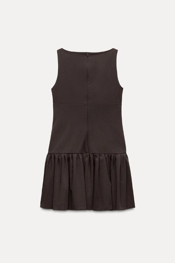 Mini dress with a ruffle design and bow, featuring a fitted silhouette, suitable for casual outings or summer events. 8