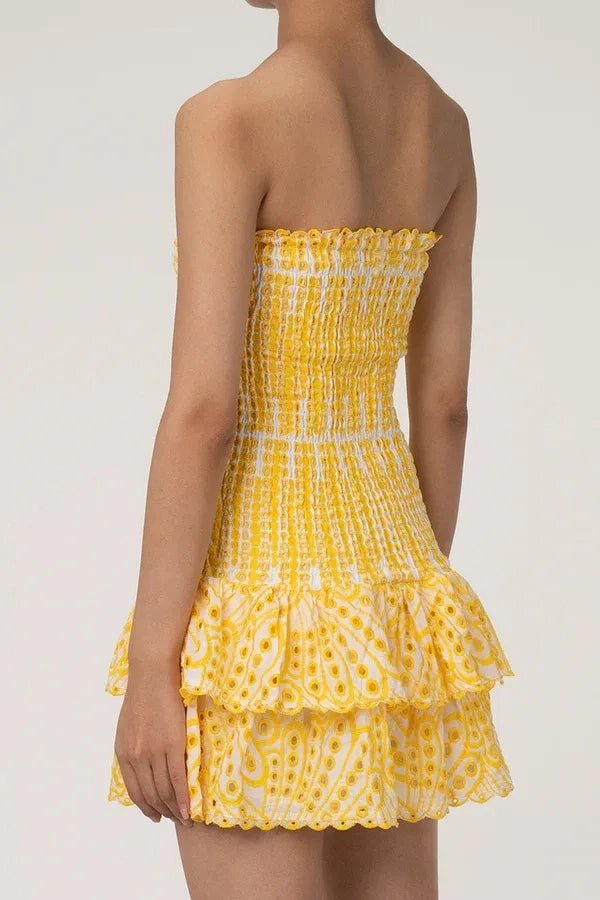 Strapless bodycon mini dress featuring intricate embroidery, perfect for a night out. 8