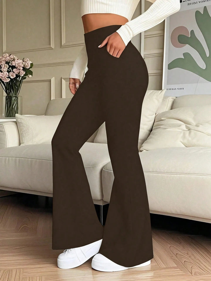 High-waisted flared jeans with a fitted silhouette, suitable for casual outings. - 2